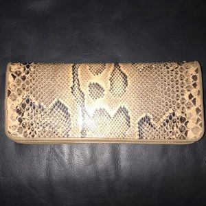 Faux python clutch